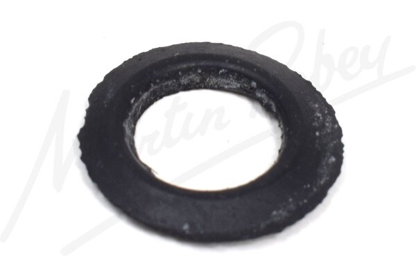 Thrower, on long end of Spindle, adjacent to Bearing